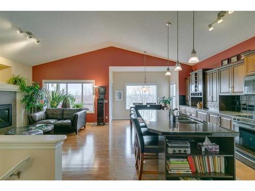 221 Sunset Heights, Cochrane, AB - Indoor With Fireplace