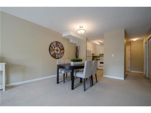 202-611 67 Avenue Sw, Calgary, AB - Indoor Photo Showing Dining Room
