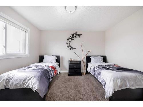 60 Martinglen Mews Ne, Calgary, AB - Indoor Photo Showing Bedroom