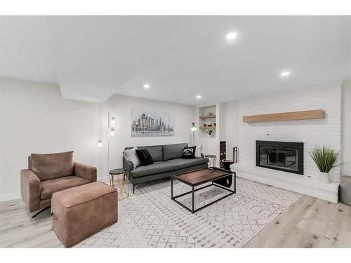3240 Alfege Street Sw, Calgary, AB - Indoor Photo Showing Other Room With Fireplace