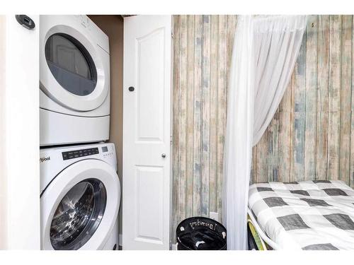 305-7130 80 Avenue Ne, Calgary, AB - Indoor Photo Showing Laundry Room