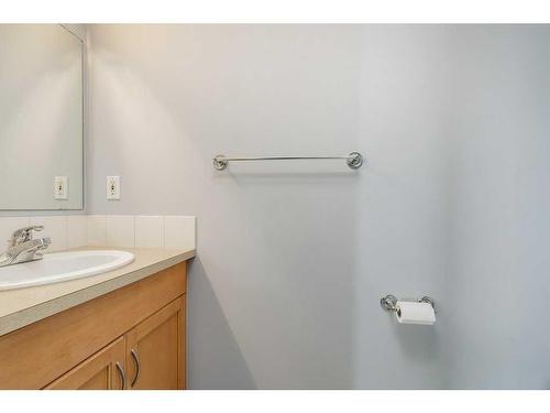 208-50 Westland Road, Okotoks, AB - Indoor Photo Showing Bathroom