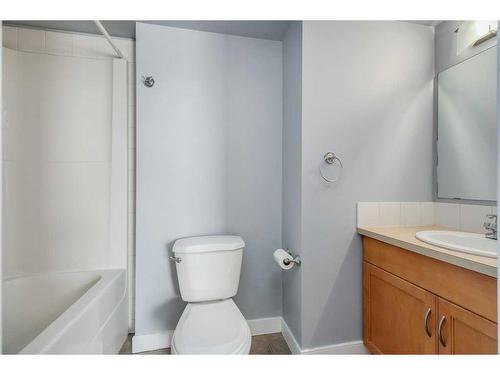 208-50 Westland Road, Okotoks, AB - Indoor Photo Showing Bathroom