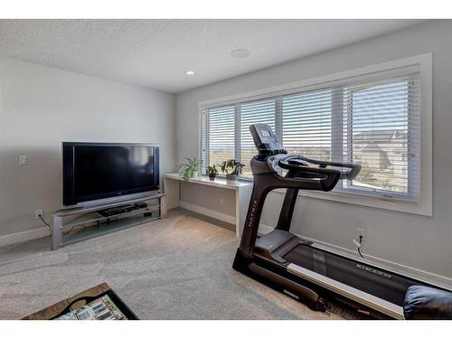 89 Rockcliff Heights Nw, Calgary, AB - Indoor Photo Showing Gym Room