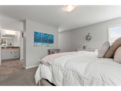 203 Bayview Circle Sw, Airdrie, AB - Indoor Photo Showing Bedroom