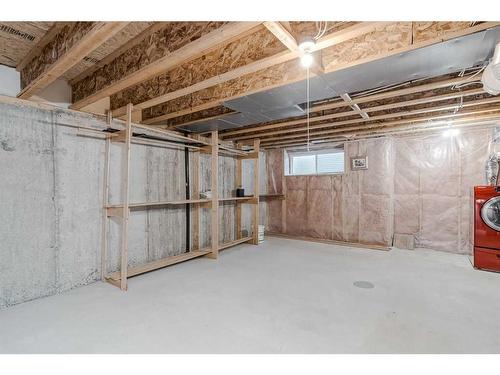 138 Eversyde Common Sw, Calgary, AB - Indoor Photo Showing Basement