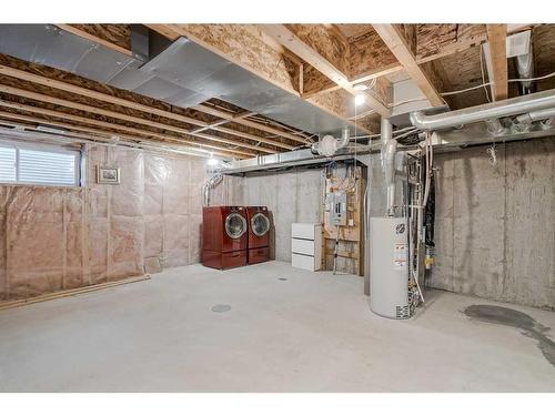 138 Eversyde Common Sw, Calgary, AB - Indoor Photo Showing Basement