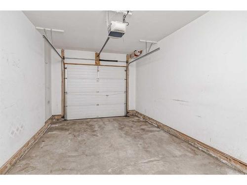 138 Eversyde Common Sw, Calgary, AB - Indoor Photo Showing Garage