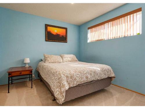 203 Dalhurst Way Nw, Calgary, AB - Indoor Photo Showing Bedroom