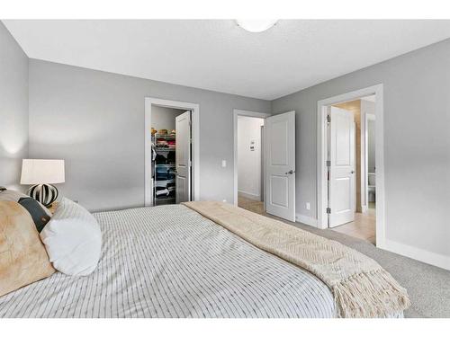 234 Mountainview Drive Nw, Okotoks, AB - Indoor Photo Showing Bedroom