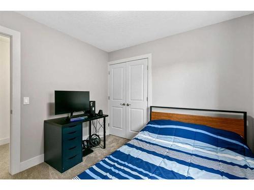 234 Mountainview Drive Nw, Okotoks, AB - Indoor Photo Showing Bedroom