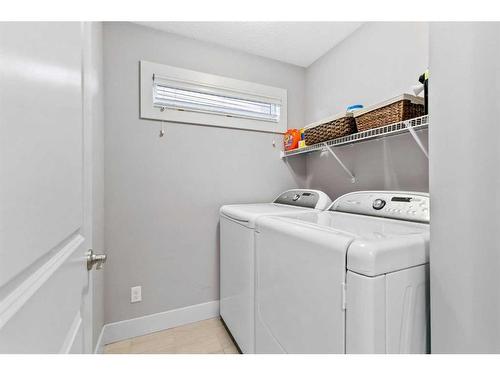 234 Mountainview Drive Nw, Okotoks, AB - Indoor Photo Showing Laundry Room