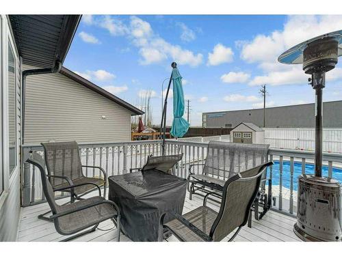 234 Aspen Creek Crescent, Strathmore, AB - Outdoor With In Ground Pool With Deck Patio Veranda With Exterior