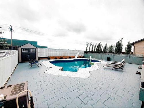 234 Aspen Creek Crescent, Strathmore, AB - Outdoor With In Ground Pool