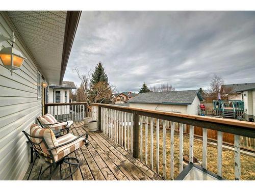 4 West Hall Place, Cochrane, AB - Outdoor With Deck Patio Veranda With Exterior