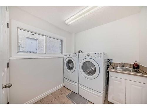 4 West Hall Place, Cochrane, AB - Indoor Photo Showing Laundry Room