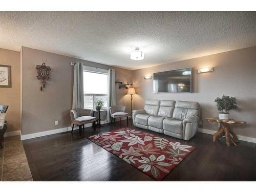 158 Tuscarora Close Nw, Calgary, AB - Indoor Photo Showing Living Room