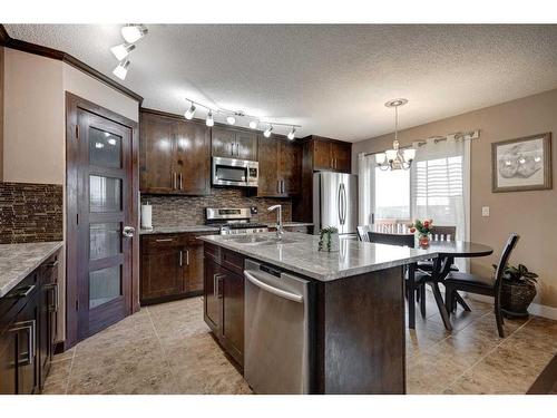 158 Tuscarora Close Nw, Calgary, AB - Indoor Photo Showing Kitchen With Upgraded Kitchen