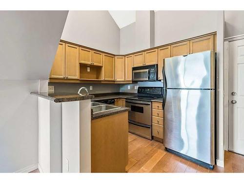 402-1833 11 Avenue Sw, Calgary, AB - Indoor Photo Showing Kitchen With Double Sink