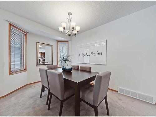 128 Edgebank Circle Nw, Calgary, AB - Indoor Photo Showing Dining Room