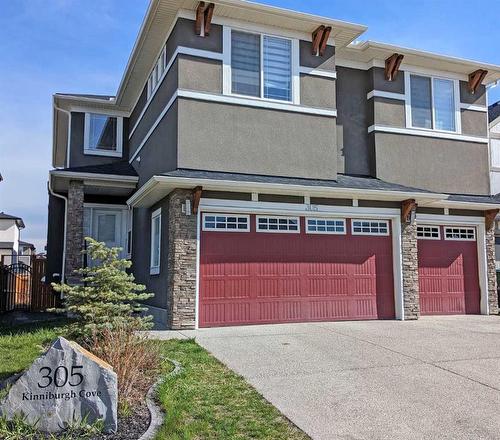 305 Kinniburgh Cove, Chestermere, AB - Outdoor With Facade