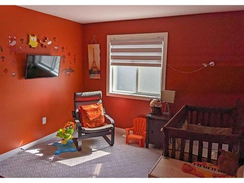 305 Kinniburgh Cove, Chestermere, AB - Indoor Photo Showing Other Room