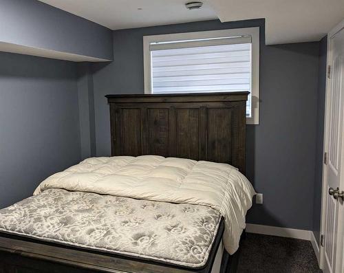 305 Kinniburgh Cove, Chestermere, AB - Indoor Photo Showing Bedroom