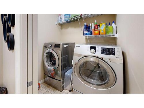 204 Westland Street, Okotoks, AB - Indoor Photo Showing Laundry Room