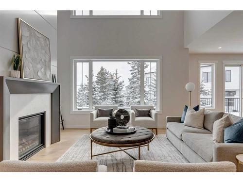 468 Discovery Place Sw, Calgary, AB - Indoor Photo Showing Living Room With Fireplace