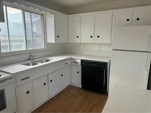 64 Whitworth Road Ne, Calgary, AB - Indoor Photo Showing Kitchen With Double Sink