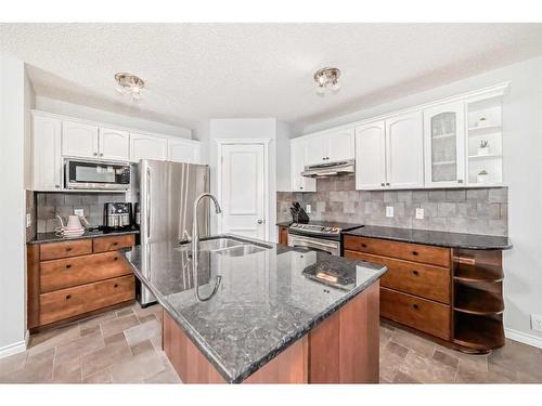 66 Prestwick Landing Se, Calgary, AB - Indoor Photo Showing Kitchen With Stainless Steel Kitchen With Double Sink