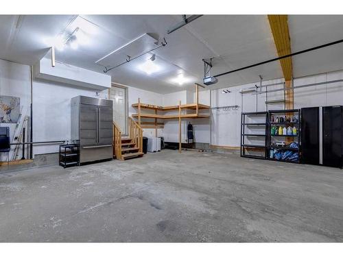 19 Elgin Estates Hill Se, Calgary, AB - Indoor Photo Showing Garage