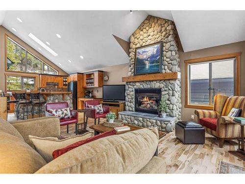 262B Three Sisters Drive, Canmore, AB - Indoor Photo Showing Living Room With Fireplace