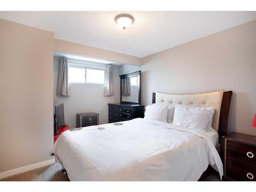 1126 New Brighton Park Se, Calgary, AB - Indoor Photo Showing Bedroom