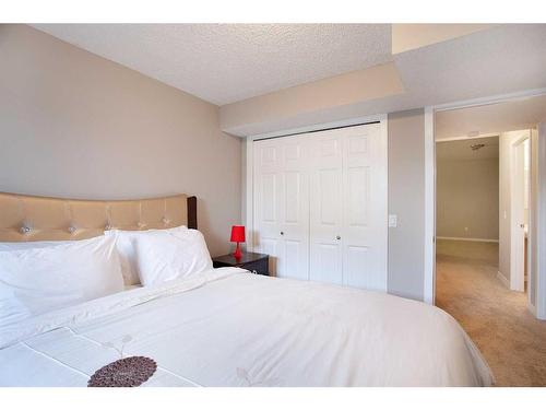 1126 New Brighton Park Se, Calgary, AB - Indoor Photo Showing Bedroom