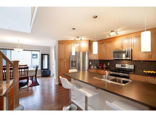 1126 New Brighton Park Se, Calgary, AB - Indoor Photo Showing Kitchen With Double Sink With Upgraded Kitchen