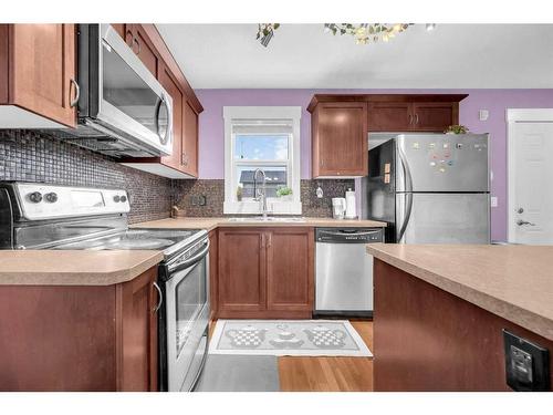 309 Skyview Ranch Drive Ne, Calgary, AB - Indoor Photo Showing Kitchen With Double Sink