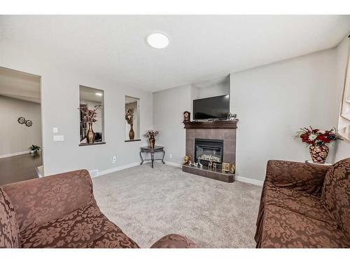 314 Evanston Drive Nw, Calgary, AB - Indoor Photo Showing Living Room With Fireplace