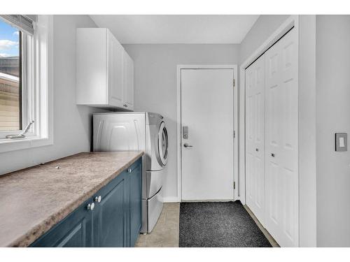 158 Shawbrooke Green Sw, Calgary, AB - Indoor Photo Showing Laundry Room