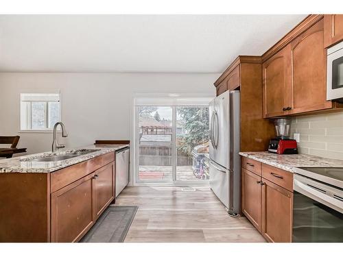 48 Shawbrooke Court Sw, Calgary, AB - Indoor Photo Showing Kitchen With Double Sink