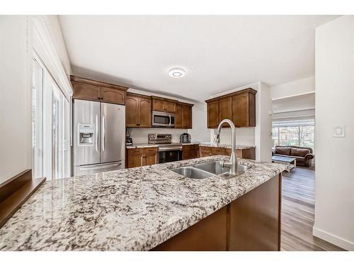 48 Shawbrooke Court Sw, Calgary, AB - Indoor Photo Showing Kitchen With Double Sink With Upgraded Kitchen