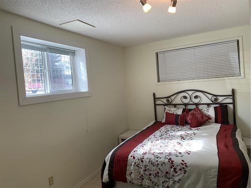 7344 Huntertown Crescent Nw, Calgary, AB - Indoor Photo Showing Bedroom