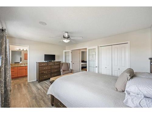 523 Stonegate Way Nw, Airdrie, AB - Indoor Photo Showing Bedroom