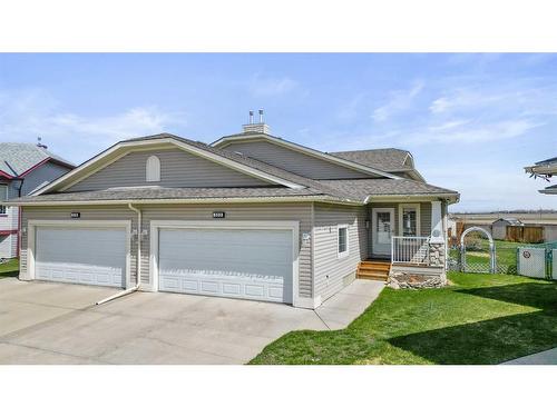 523 Stonegate Way Nw, Airdrie, AB - Outdoor With Facade