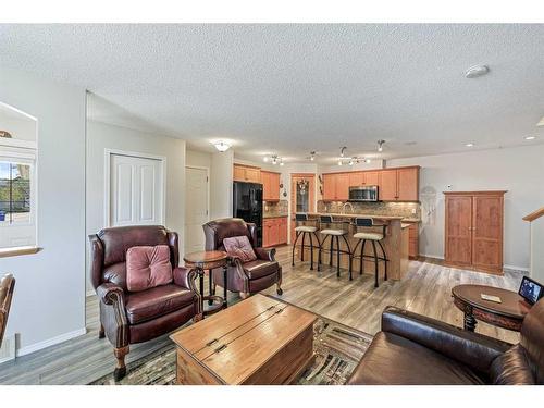 523 Stonegate Way Nw, Airdrie, AB - Indoor Photo Showing Living Room