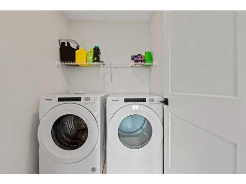 141 Knight Avenue, Crossfield, AB - Indoor Photo Showing Laundry Room