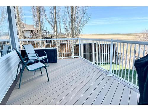 561 Diamond Crescent, Diamond Valley, AB - Outdoor With Deck Patio Veranda With Exterior