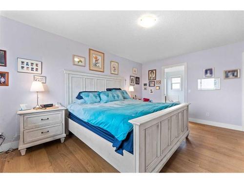 561 Diamond Crescent, Diamond Valley, AB - Indoor Photo Showing Bedroom
