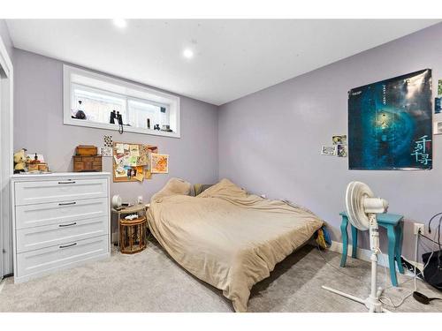 561 Diamond Crescent, Diamond Valley, AB - Indoor Photo Showing Bedroom
