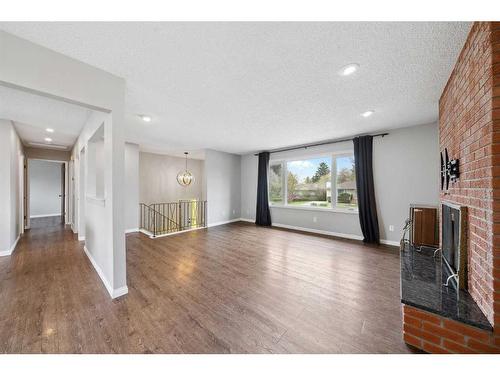 4307 45 Street Sw, Calgary, AB - Indoor With Fireplace